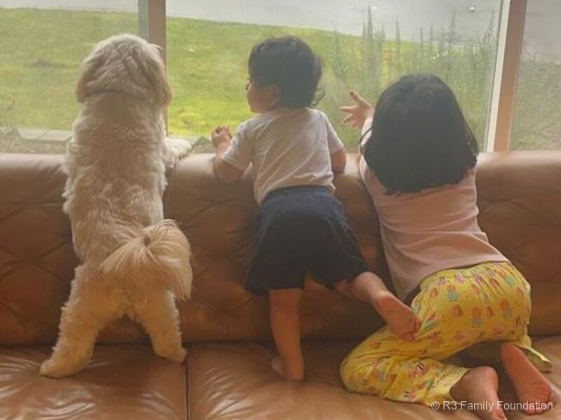 Rafa, Raghav and Raahi watching the rain together